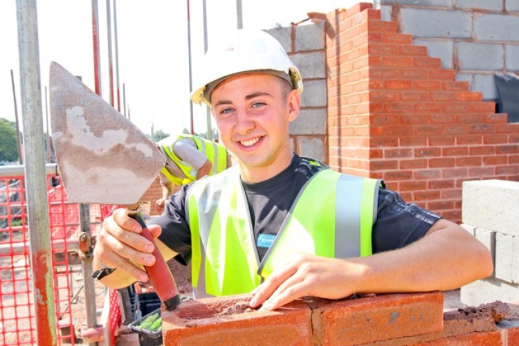 A Redrow apprentice deploys traditional construction skills