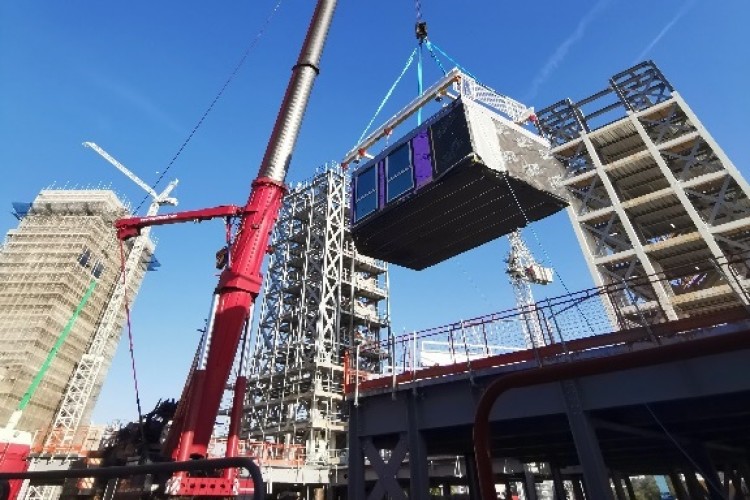 A 500-tonne crane is placing six modules a day 