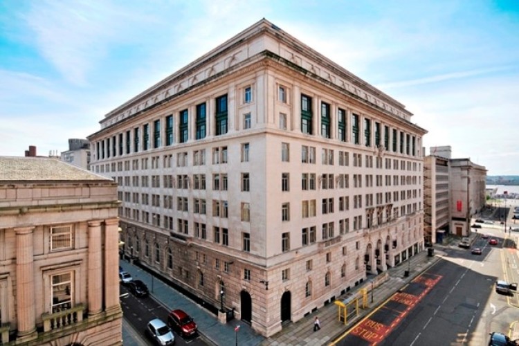 Clad in Portland stone and with a roof of green Lombardic tiles, India Buildings is a well-known landmark in Liverpool