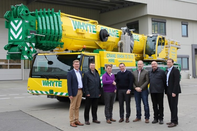 At the handover of Whyte Crane Hire&rsquo;s latest Liebherr LTM 1300-6.2 are, left to right, Reinhold Breitenmoser and Richard Everist (both Liebherr), Lawrence Whyte (Whyte Crane Hire), Christoph Kleiner (Liebherr), Mark Syme (Whyte), Brian Lang and Mich
