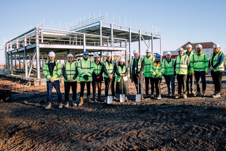 A sod cutting ceremony was held to mark completion of the structural steel frame