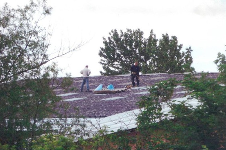 The roofers were spotted working without any safety equipment by a passing HSE inspector