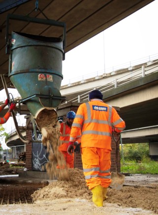 the concrete hardstanding being poured