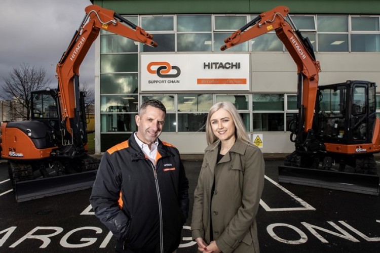 Hitachi director of product support Stephen Creaser (left) with Olivia Brow,  a solicitor with Ward Hadaway who helped with the property deal, in front of the new building  