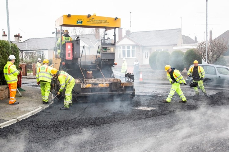 Roadway Civil Engineering & Surfacing lays the asphalt