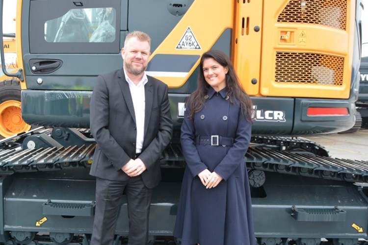 Hyundai UK sales manager Tony Reeves (left) and Datag business development executive Rachel Hamilton with the first Hyundai machines fitted with Datatag CESAR marking at Tilbury Port, Essex