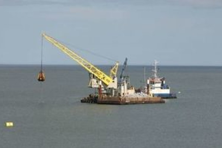 Strekker crane barge at work in Portsmouth Harbour