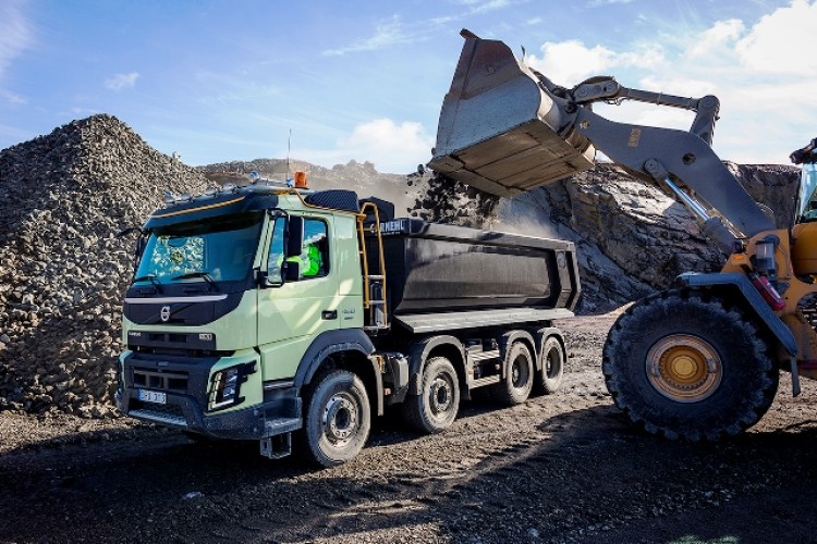 A Volvo FMX truck in action