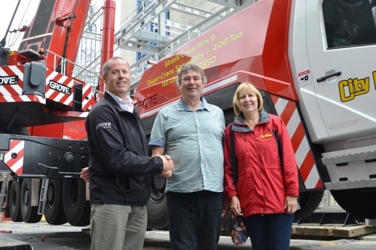 Manitowoc UK sales manager Jerry Welford (left) with Trevor and Clare Jepson of City Lifting