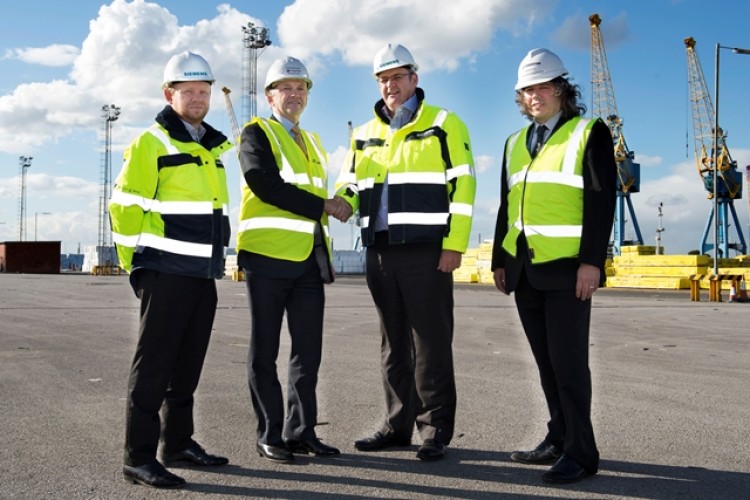 From left to right are Siemens&rsquo; general manager Shaun Cray and project director Finbarr Dowling, Clugston Construction&rsquo;s managing director Steve Radcliffe and business unit manager Martin Tuck