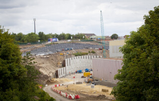 The soil nailed wall with king post wall in the foreground