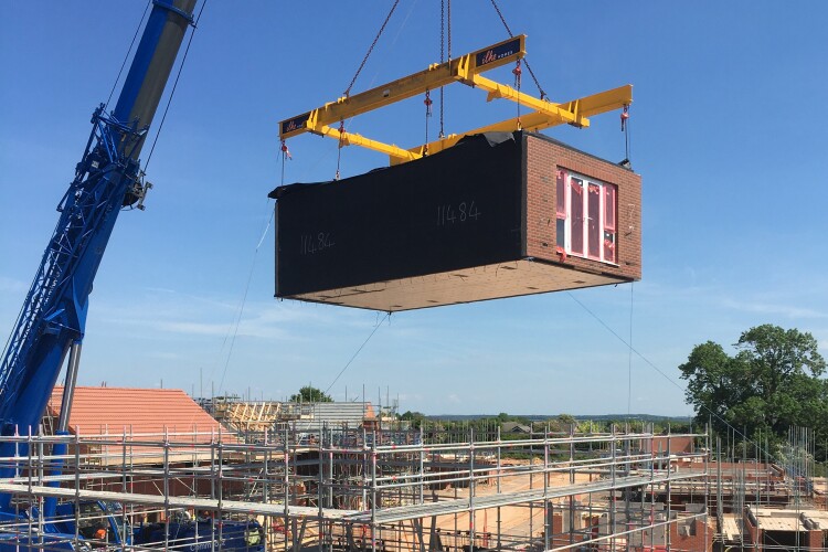 An Ilke unit being lifted into place