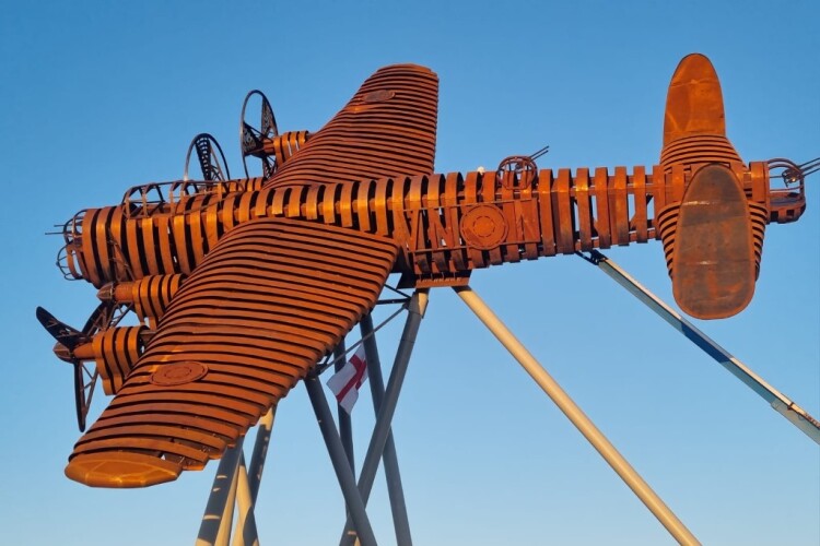 The Lancaster Bomber sculpture has been tilted to give the impression that it is in flight and heading home to RAF Swinderby, a former RAF station nearby