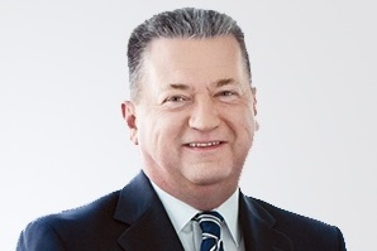 SNC-Lavalin's British CEO Neil Bruce previously spent 15 years at Amec as chief operating officer and executive director 