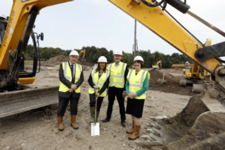 Stockton council leader Bob Cook, HCA manager Marie Kiddell (with spade), Muse surveyor Simon Dew, Teesside University director Laura Woods gather for a groundbreaking ceremony