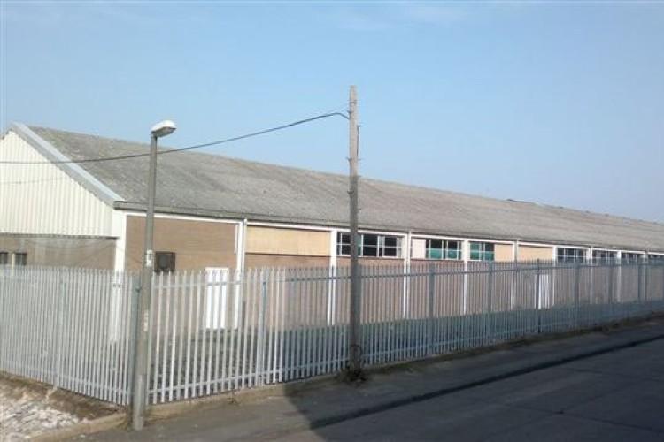 The building on which Industrial Roofing (Surrey) Ltd was working