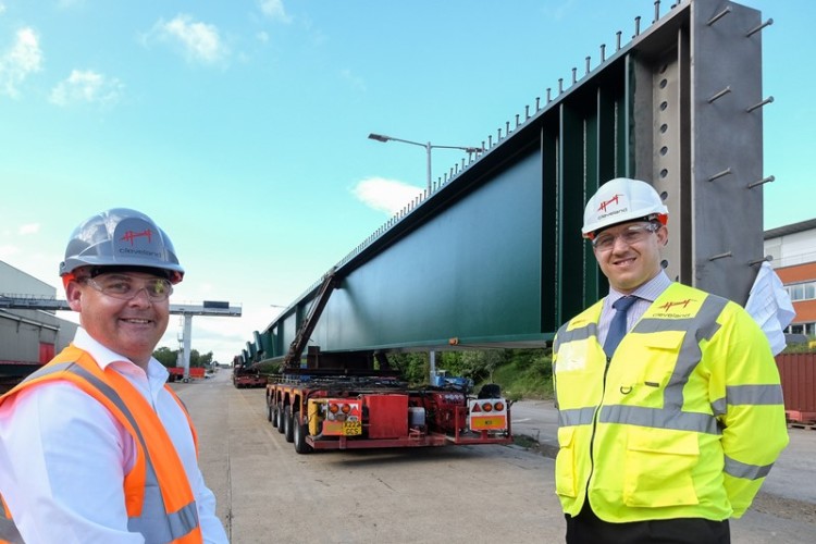 Factory manager Richard Parker (left) and project manager Michael Whinn with one of the 56-metre girders