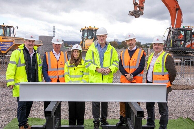 Left to right on site are Dan Gallagher (Stoford), Mark Stirling (LondonMetric), Sarah Stocken (M&S), Cllr Ian Boulton (South Glos Council), Chris Tsakumis (EDC) and James Mandley (Winvic)