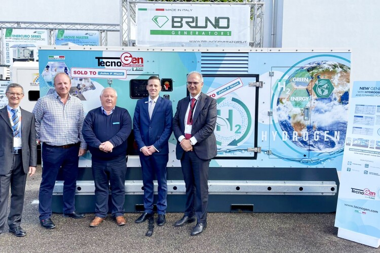 With the generator are (l to r) Punch Hydrocells chief engineer Roberto Golisano, David Hunt and Kevin Davies from John F Hunt Power, Punch Flybrid MD Tobias Knichel, and BGG founder Renato Bruno