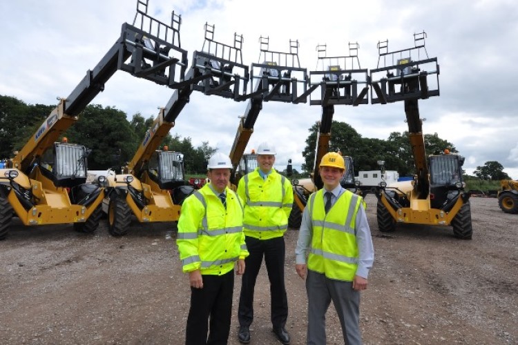 John Smith and Paul Allman of Hawk with Andy Davies of Finning