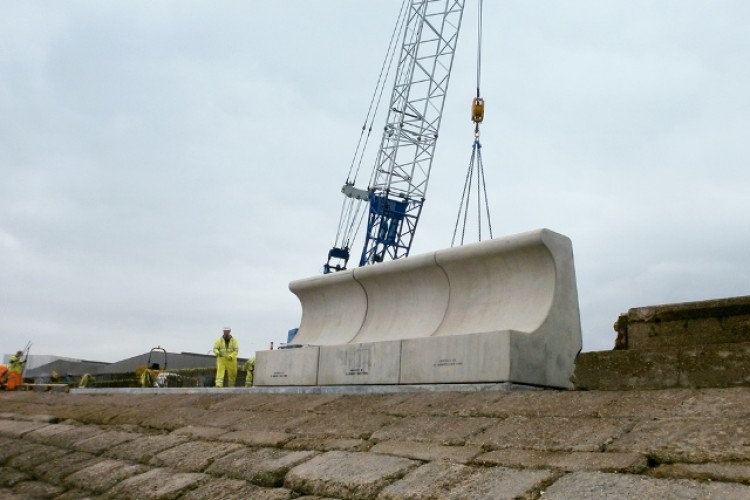 Lifting one of the 20t blocks into place