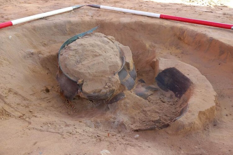 a Coptic bowl is unearthed in sandy Suffolk soils [ &copy; Oxford Cotswold Archaeology ] 