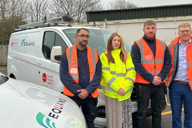 Birmingham city councillor Nicky Brennan, cabinet member for housing (in yellow) with Equans electrician Shaan Uddin, plumber Joshua Koo and operations director James Lindsay