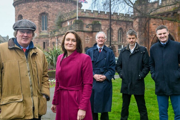 McAlpine directors Sir Andrew McAlpine and Mark Gibson on a site visit with vice chancellor Julie Mennell and other university representatives