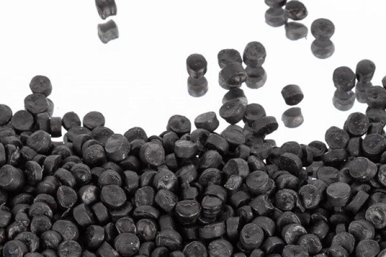 Pellets containing graphene and recycled plastics are meted into the aggregate mix