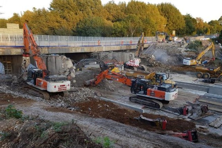 Work to demolish the western part of the Romsey Road bridge over the M27 in Hampshire on Saturday evening 
