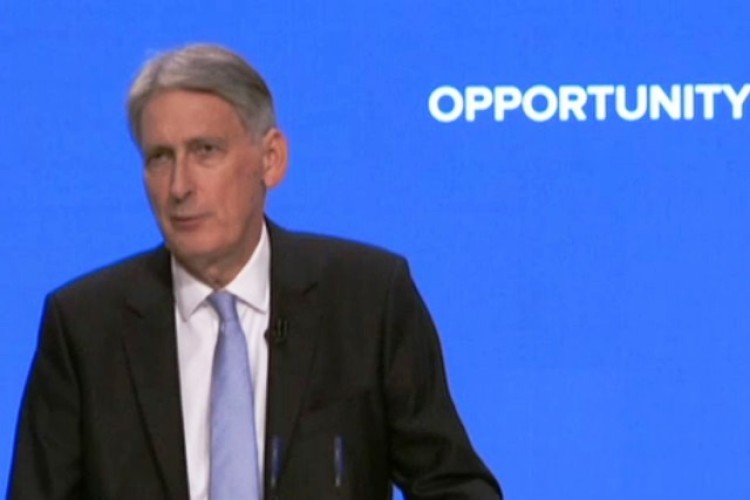 Chancellor Philip Hammond addresses the Conservative Party's annual conference