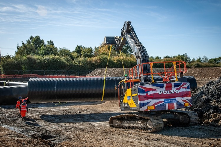 Volvo EC250E with flag livery