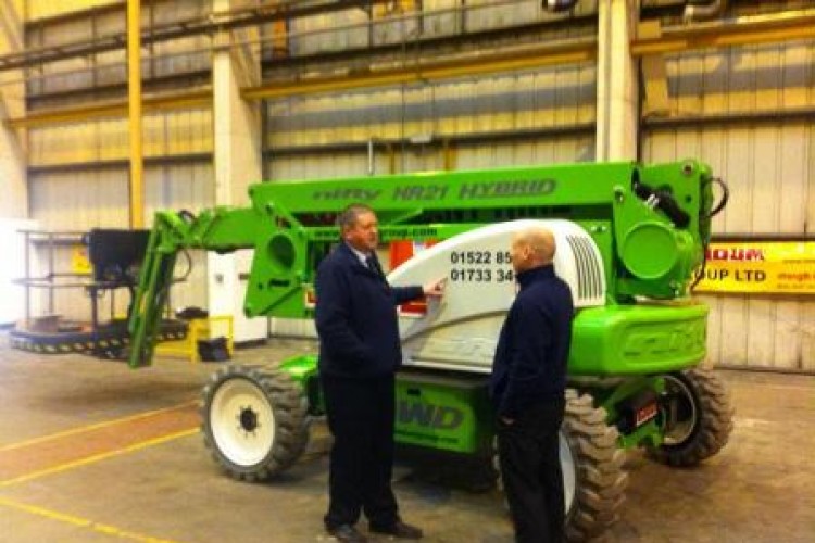Tom Robinson and Shane Martin of Lindum Plant with their first HR21 Hybrid AWD