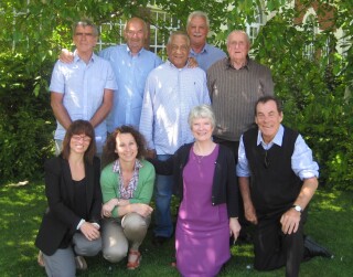 Pickets, families and campaigners: Back (L-R) Bernard Williams, Kevin Butcher, Michael Pierce, Terry Renshaw, Ken O'Shea. Front (L-R): Dawn McKinsie Jones, Melanie McKinsie Jones, Eileen Turnbull (researcher),  Harry Chadwick (chairperson).