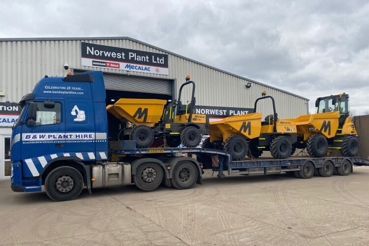 B&W collects new dumpers from the local dealer