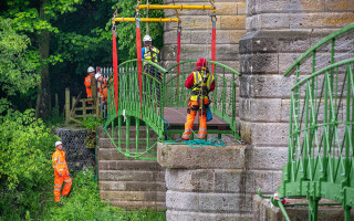 A 55-tonne-capacity crane and rope access specialists re-installed the restored footbridge near Kelso