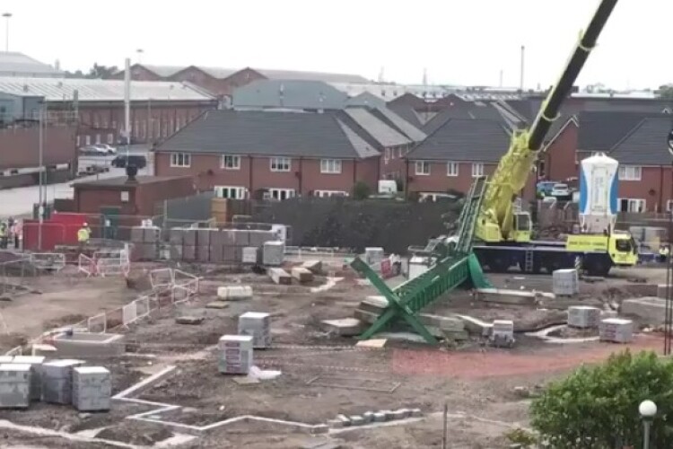 The freestanding tower crane toppled over