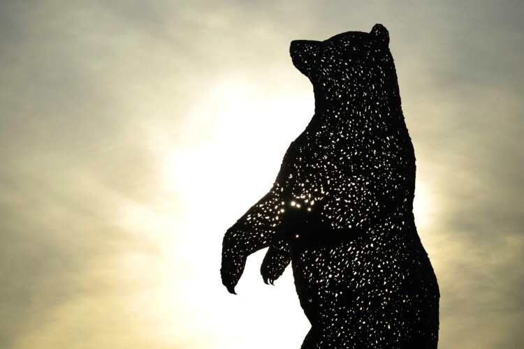 The 54.3-acre development is designed around the DunBear sculpture of a brown bear.