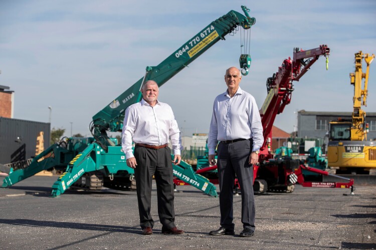 Mark Davenport (left), new owner and managing director of A Mini Crane Hire, with Peter Piekarus, the former owner and company founder 