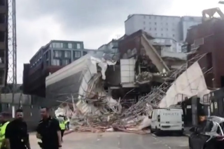 The scaffolding was screening a derelict shopping centre that is being demolished by McGee