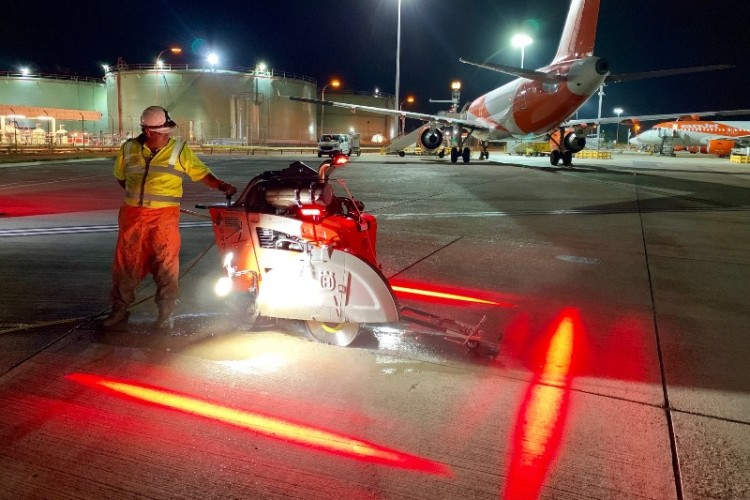 Red lights are used to illuminate the exclusion zone