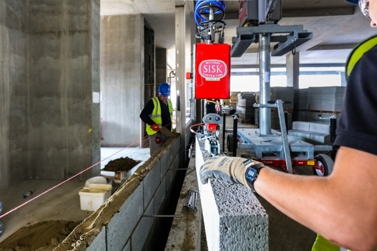 Sisk uses a Material Unit Lift Enhancer (MULE) for placing building blocks at Wembley Park multi-storey car park