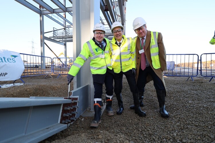 Wates construction regional operations director Neil Matthias (left) with Envision AESC chief executive Shoichi Matsumoto (centre) and Sir James Wates (right)