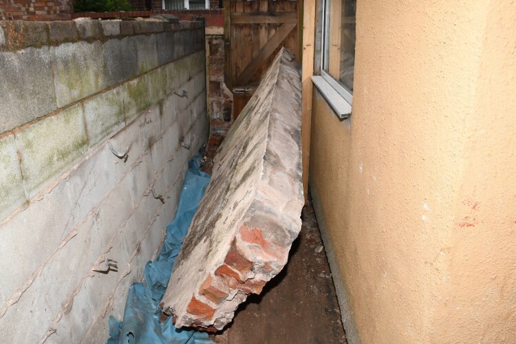 The collapsed section of wall