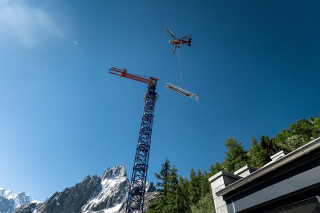 The helicopter made 30 trips to deliver the crane components