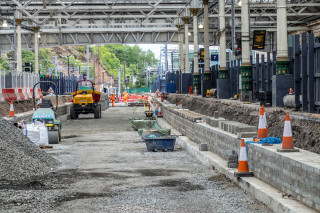 Story carried out track modifications and installed new escalators (above) at Waverley Station