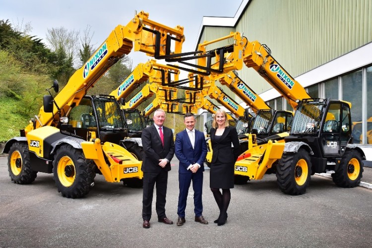  At JCB HQ in Rocester are (left to right) Scot JCB regional manager Paul Coates, Nixon Hire MD Graham Nixon and JCB director Yvette Henshall-Bell