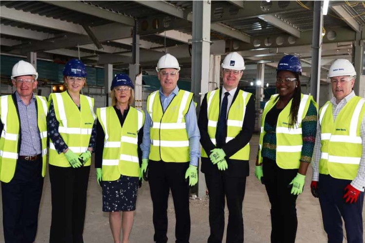  Richard Lochhead (centre) made the announcement during a visit to see Balfour Beatty's progress on Strathclyde University's new building