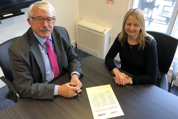 Chris Blythe (left) and Francesca Berriman sign the memorandum of understanding