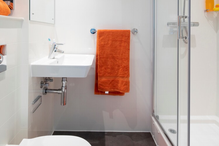 Glass reinforced plastic shower pod from Offsite Solutions. Images courtesy of Mace Developments